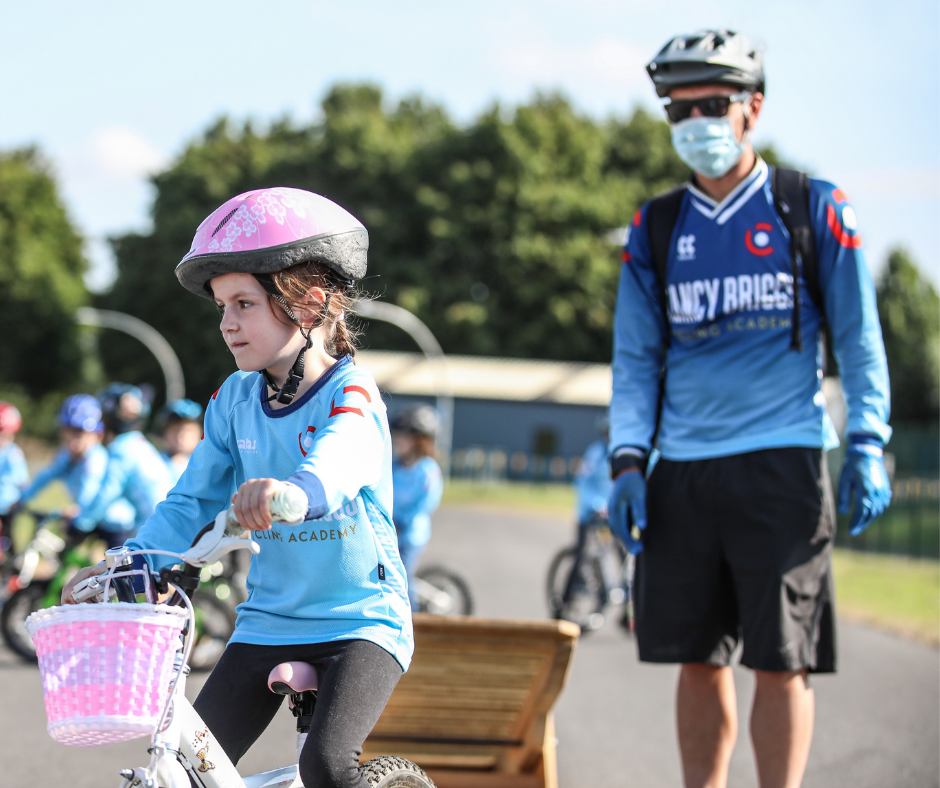 Social distancing is in place for classes and coaches wear masks